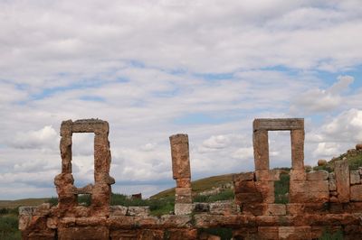 Old ruins against cloudy sky