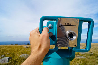 Close-up of coin-operated binoculars