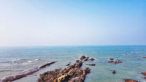 Scenic view of sea against clear sky