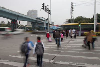 People walking on city street