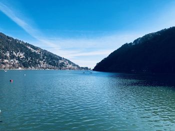 Scenic view of sea against blue sky