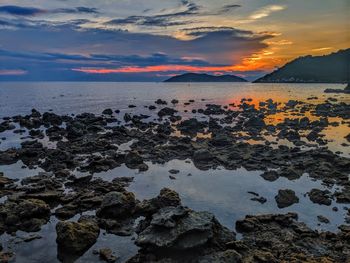 Scenic view of sea against sky during sunset