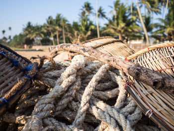 Close-up of rope tied to wooden post