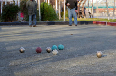 Children playing with ball on floor