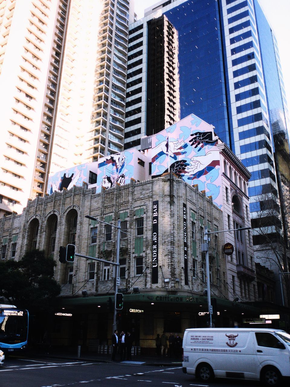 LOW ANGLE VIEW OF BUILDINGS AND CITY STREET