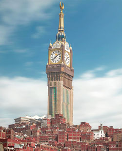 Low angle view of buildings in city against sky