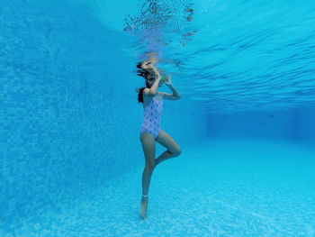 Full length of woman swimming in sea