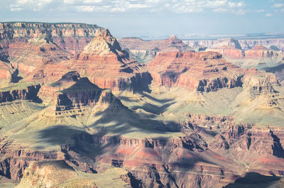 Aerial view of landscape with mountain range in background