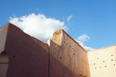 Low angle view of old building against sky