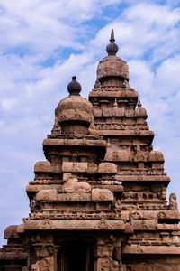 View of temple against cloudy sky