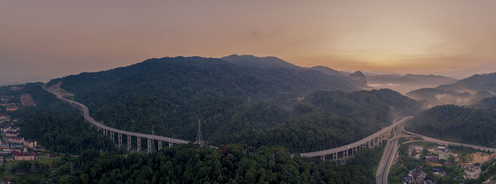 High angle view of mountain road against sky during sunset