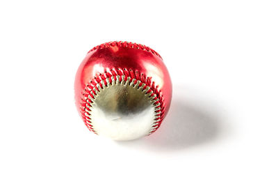 Close-up of red ball on white background