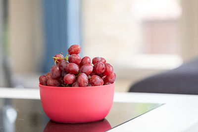 Close-up of strawberries in bowl on table