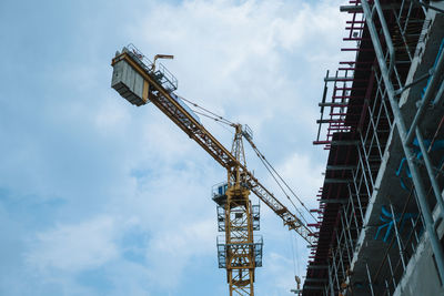 Building construction with crane