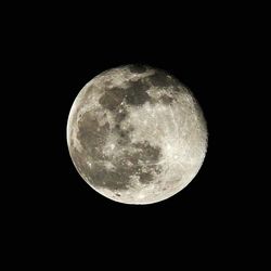 Low angle view of moon in sky