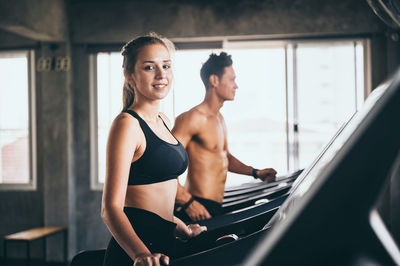 Young couple looking at camera