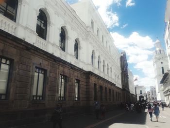 Group of people in front of building