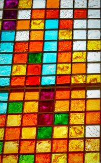 Full frame shot of multi colored glass wall