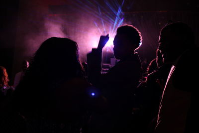 Audience enjoying popular music concert