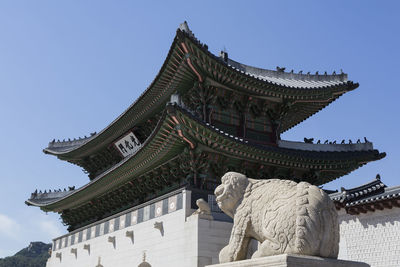 Low angle view of statue against clear sky