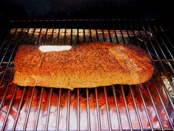 Close-up of meat on barbecue grill