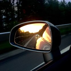 Reflection of car on road