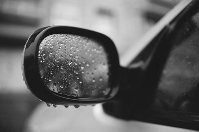 Close-up of water drops on car