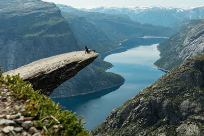 Scenic view of mountains by sea