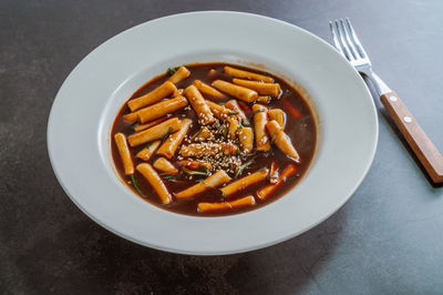 High angle view of pasta in bowl on table