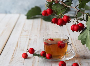 Red berries on table