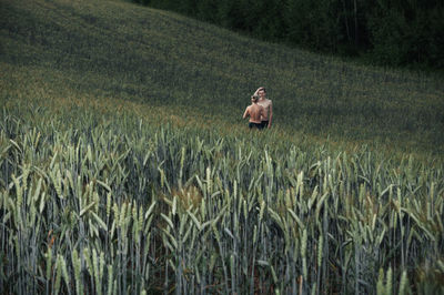 Full length of man standing in farm