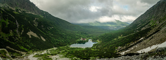 Panoramic view of lake and mountains against sky