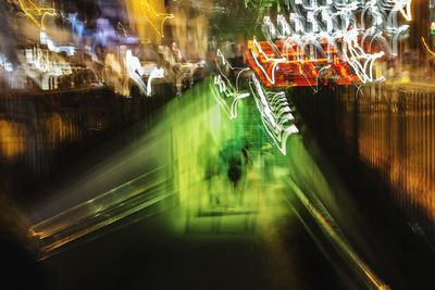 Light trails on street in city at night