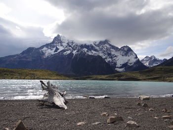 Scenic view of snowcapped mountains against sky