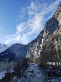 Scenic view of mountains against sky during winter