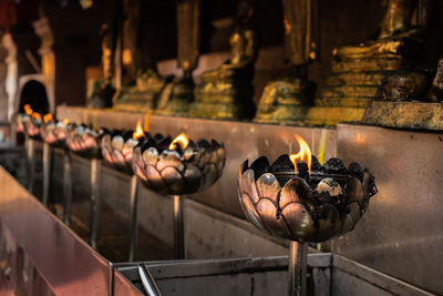 Burning candles in temple