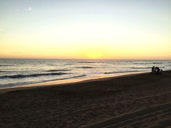 Scenic view of beach during sunset