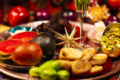 Close-up of fruits in plate on table