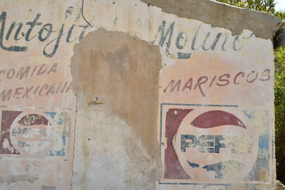 Close-up of graffiti on wall