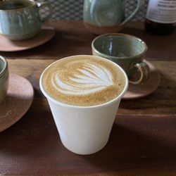 Close-up of cappuccino served on table