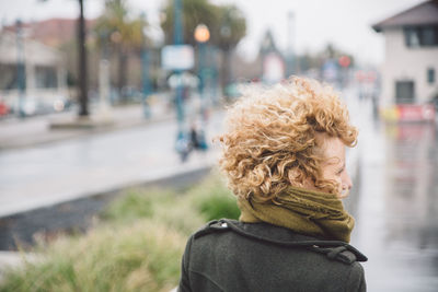 Rear view of woman in city