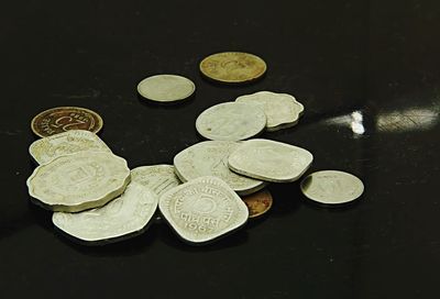High angle view of coins