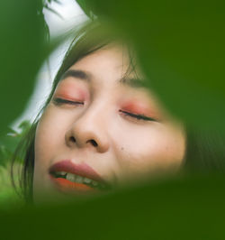 Close-up portrait of young woman