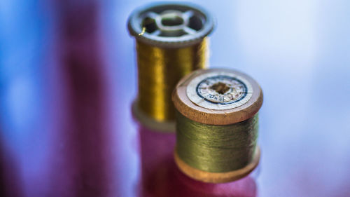 Close-up of coins in container