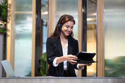 Young woman using mobile phone