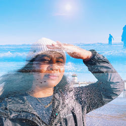 Rear view of man swimming in sea