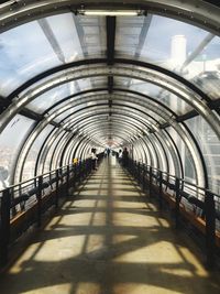 People walking on bridge