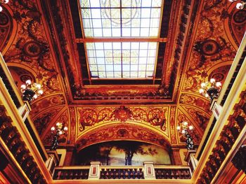 Low angle view of chandelier in building