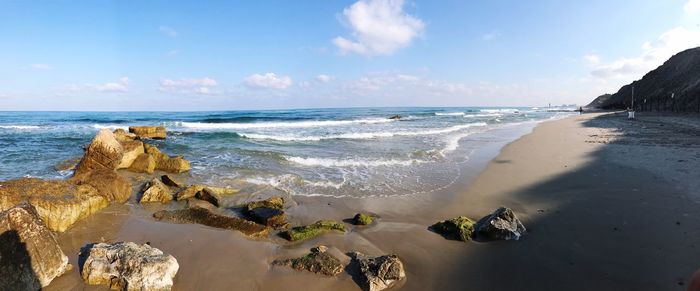 Panoramic view of beach against sky