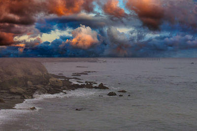 Scenic view of sea against sky during sunset